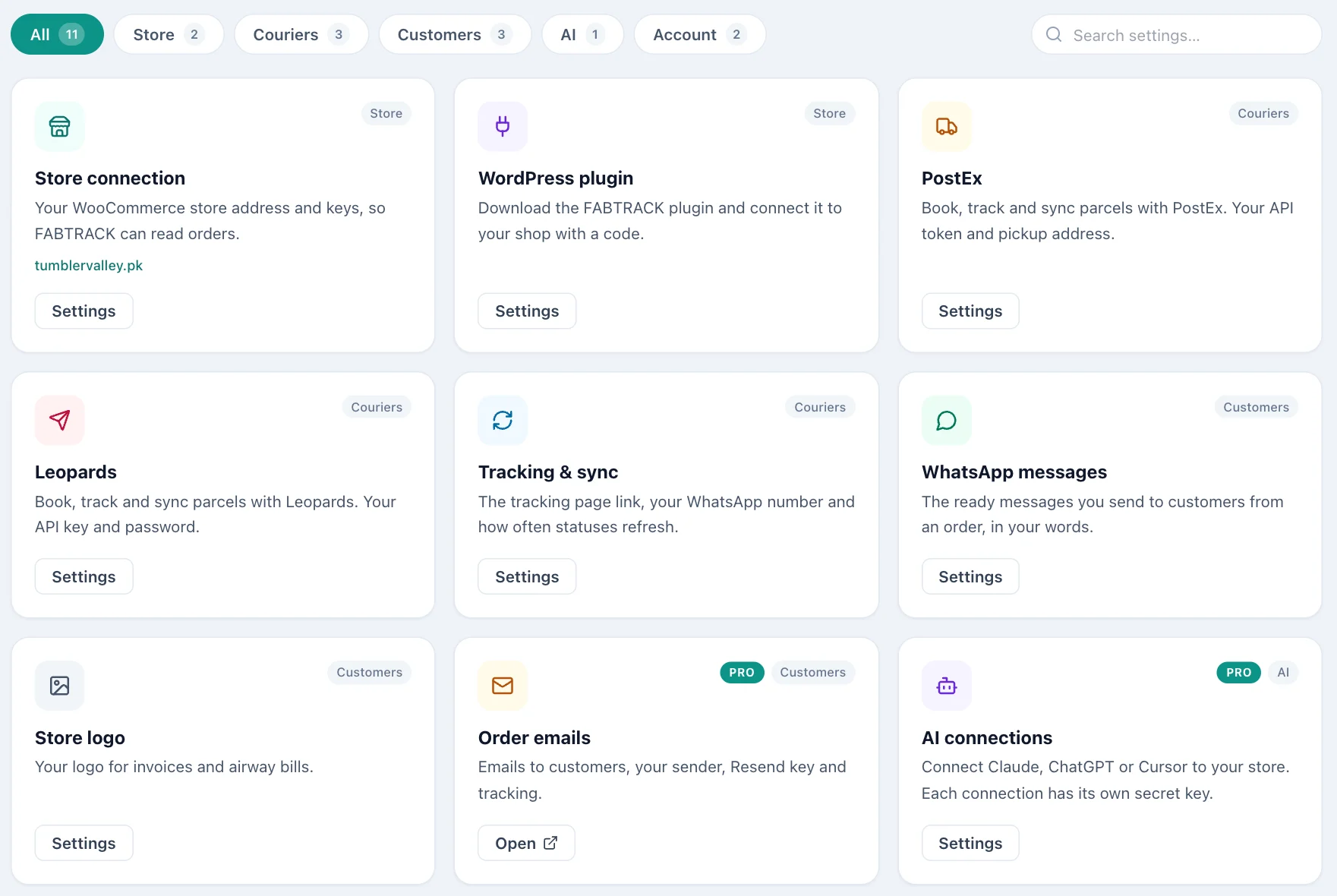 Settings page made of cards: store connection, plugin, PostEx, Leopards, tracking, WhatsApp, logo, emails and AI.